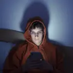 Teen Using Smartphone