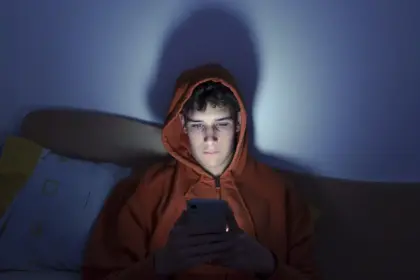 Teen Using Smartphone