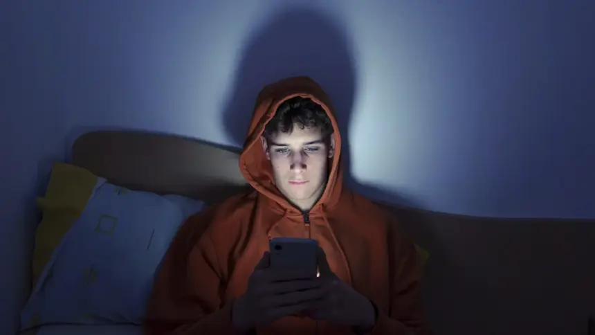 Teen Using Smartphone
